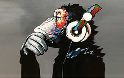 Graffiti-inspired portrait of a monkey in headphones, featuring vibrant multicolored paint drips. Hand-painted artwork blending street-art and pop-culture styles.