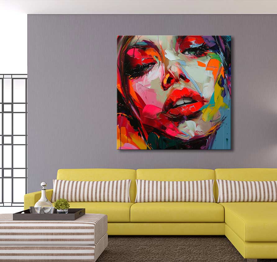 Françoise Nielly-signature 'Linda in Love' painting on gray wall, vibrant woman's portrait, above yellow sectional sofa, embodying expressive pop art style.