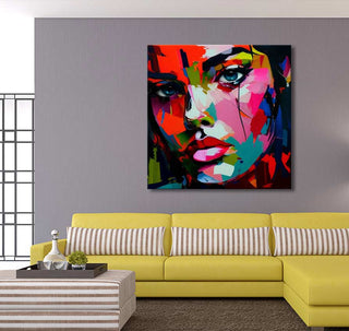 Contemporary living room featuring Françoise Nielly's 'Jacky in the Afternoon'—a vivid, hand-painted pop art portrait of a woman, perfect for modern interiors.