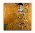 Gustav Klimt – Woman in Gold, hand-painted oil reproduction of a woman in a gilded, geometric dress against a gold-flecked background, ready to hang.
