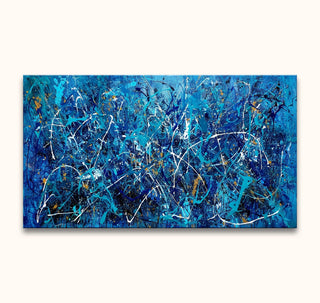 Abstract expressionist painting, 'The Big Blue', inspired by Jackson Pollock, features blue splatter style with white and gold accents. Ready to hang on wooden frame.
