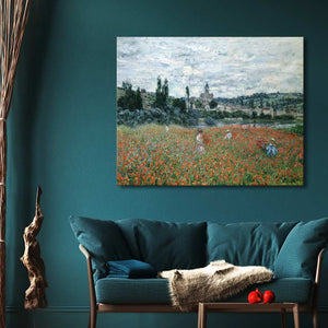 Claude Monet's Poppy field near Vétheuil impressionist landscape painting above teal loveseat, adding elegance to a modern, nature-inspired sitting area.
