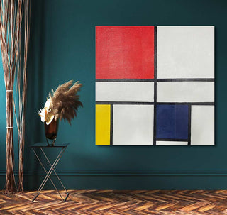 Piet Mondriaan's 'Compositie in Rood, Geel en Blauw' hangs above a modern side table in a moody interior, showcasing bold abstract lines and colors.