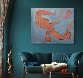 Picasso's The Swimmer painting over a teal loveseat with textured cushions, a driftwood sculpture, and a wooden table with red accent balls in a modern setting.