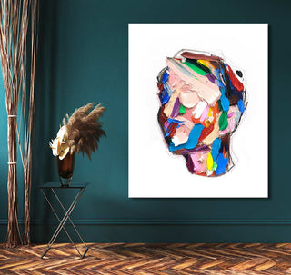 Abstract painting 'Another Insight' by Joseph Lee, showcasing a colorful human head silhouette on canvas, mounted in a modern room with a side table and decorative elements.