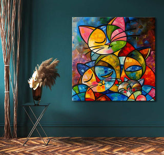 Picasso signature - Cat Lovers 5: Hand-painted cubist artwork depicting colorful, sleeping cats on canvas, mounted on a wall above a chic black side table.