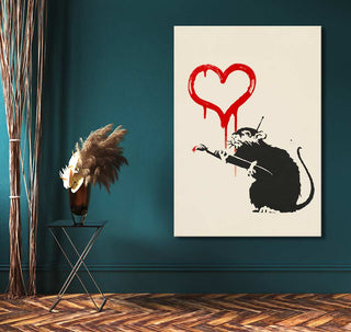 Banksy - The Rat artwork: stencil-style rat with paintbrush and red heart. Mounted on wall, perfect for pop art enthusiasts. Includes hanging system, UV-protected.