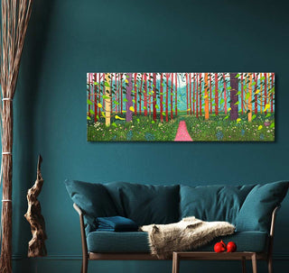 David Hockney - Arrival of Spring: Hand-painted landscape with a pink path through a forest, displayed above a teal sofa in a modern living space.