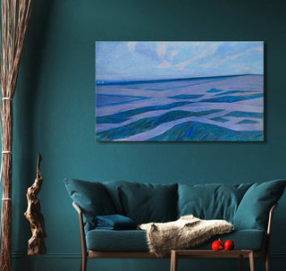 Piet Mondriaan's 'Duinlandschap bij Domburg' oil painting in a teal living room, above a teal sofa with a faux-fur throw and wooden side table.